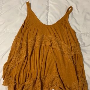 mustard float tank top with lace accents